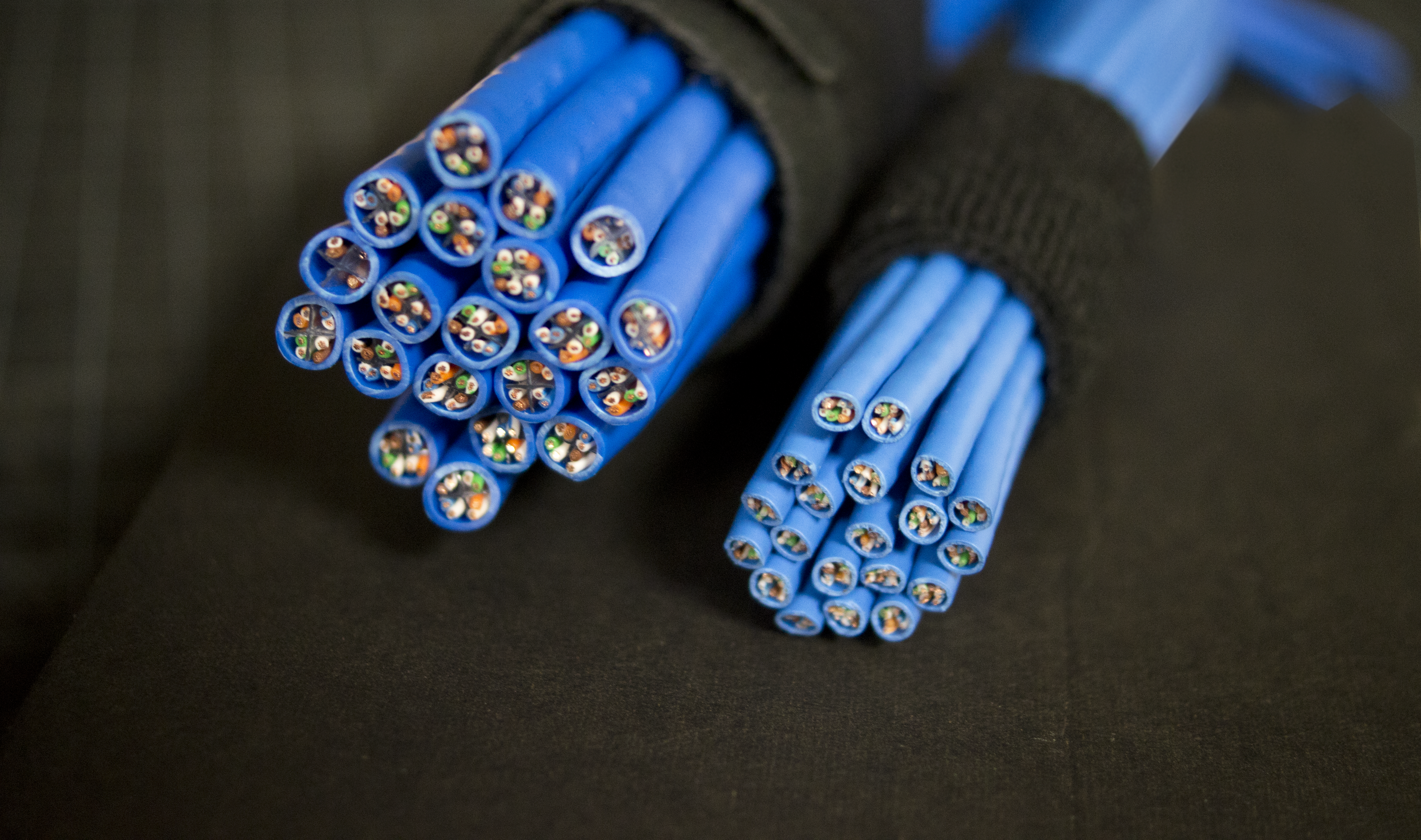 Super Slim Cat6A vs Standard Cat6A - Cable diameter comparison showing 50% thinner profile